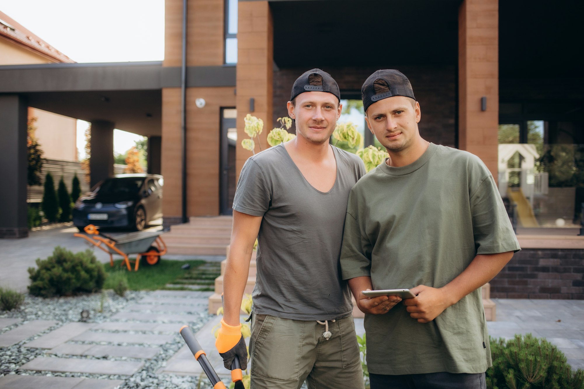 portrait of male gardeners at the facility